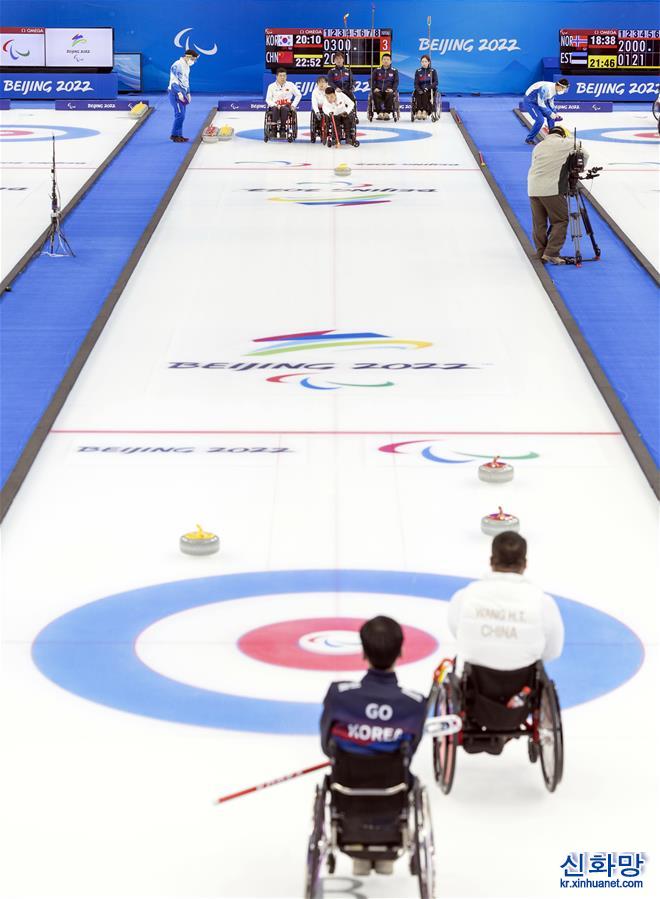 （北京冬殘奧會）輪椅冰壺——迴圈賽：中國隊勝韓國隊